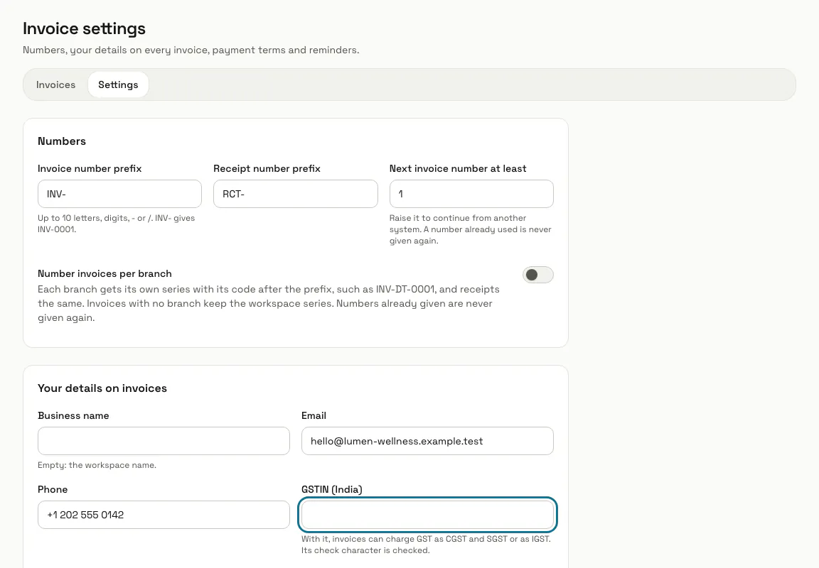 Invoice settings with the number prefixes, your business details and the "GSTIN (India)" field outlined